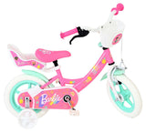 Rosa Kinderfahrrad mit Barbie-Motiven und Korb vorne