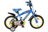 Blaues Kinderfahrrad mit gelben Reifen und Comic-Motiv auf dem Sattel