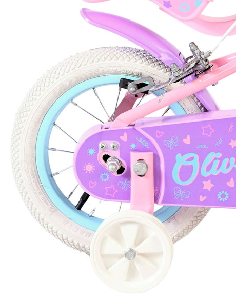 Rosa Kinderfahrrad mit weißen Reifen und bunten Motiven