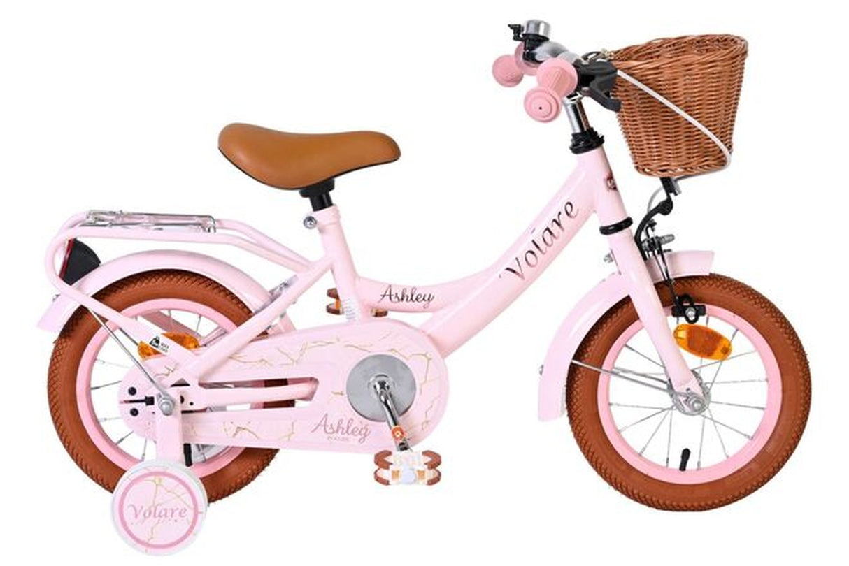 Rosa Kinderfahrrad mit Korb, braunen Reifen und beigem Sattel
