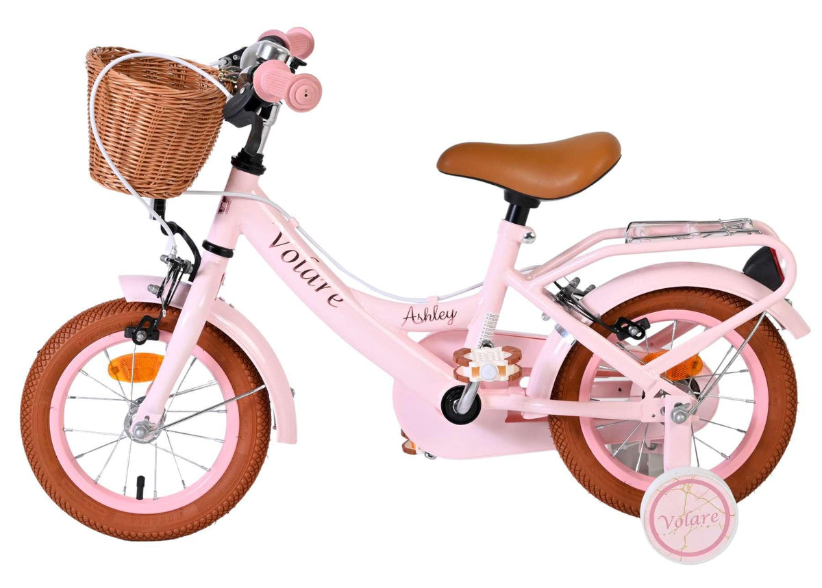 Rosa Kinderfahrrad mit Korb, braunem Sattel und stabilen Reifen