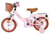 Rosa Kinderfahrrad mit Korb, braunem Sattel und stabilen Reifen