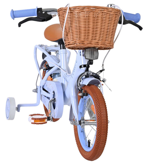 Kinderfahrrad in Blau mit Korb und braunen Reifen