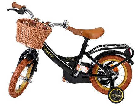 Schwarzes Kinderfahrrad mit Korb, braunen Griffen und Reifen