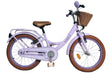 Lila Kinderfahrrad mit Korb und braunem Sattel, stabiler Rahmen