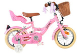 Rosa Kinderfahrrad mit Korb, Sattel und Rücksitz für ein Kind
