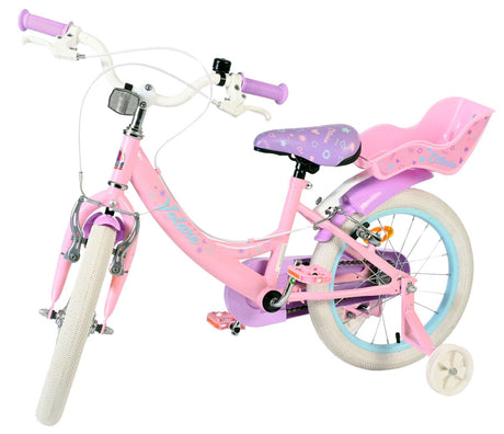 Rosa Kinderfahrrad mit einem Sitz für Puppen und weißen Reifen