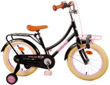 Schwarzes Kinderfahrrad mit pinken Akzenten und stabilen Reifen