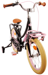 Schwarzes Kinderfahrrad mit pinken Akzenten und breiten Reifen