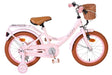 Rosa Kinderfahrrad mit Korb und braunen Reifen
