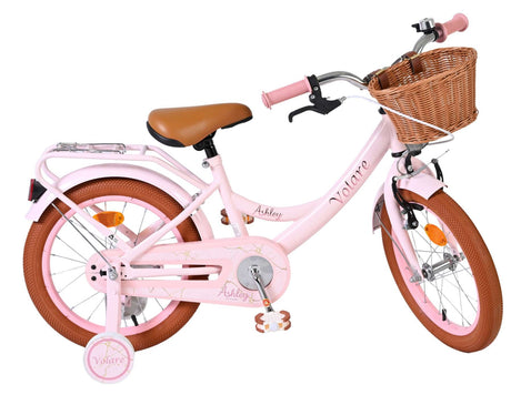 Rosa Kinderfahrrad mit Korb und braunem Sattel