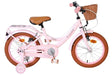 Rosa Kinderfahrrad mit Korb und braunen Reifen