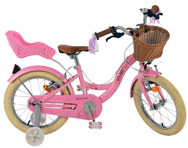Rosa Kinderfahrrad mit Korb und Sitz für ein Kind hinten