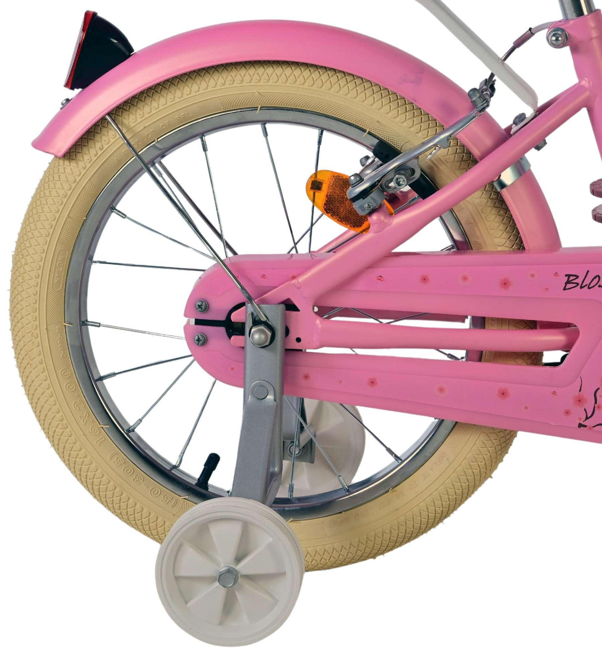 Rosa Fahrrad mit beigem Reifen und Stützrädern, seitliche Ansicht
