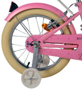 Rosa Fahrrad mit beigem Reifen und Stützrädern, seitliche Ansicht
