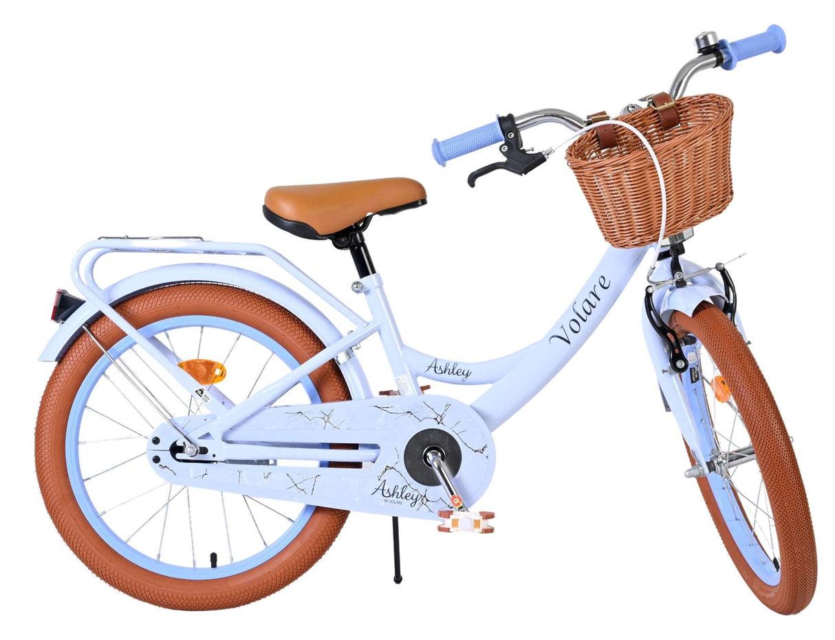 Kinderfahrrad in Hellblau mit Korb und braunen Reifen