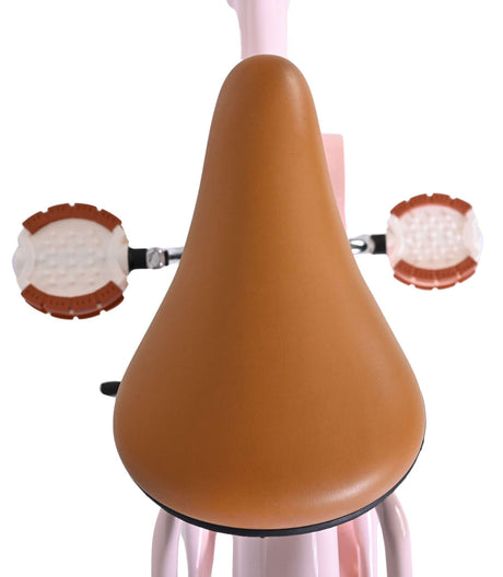 Rosa Kinderfahrrad mit braunem Sattel und weißen Handgriffen