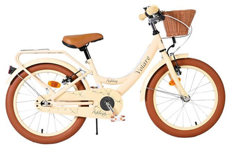 Beige Kinderfahrrad mit Korb, braunen Reifen und gepolsterter Sitzfläche