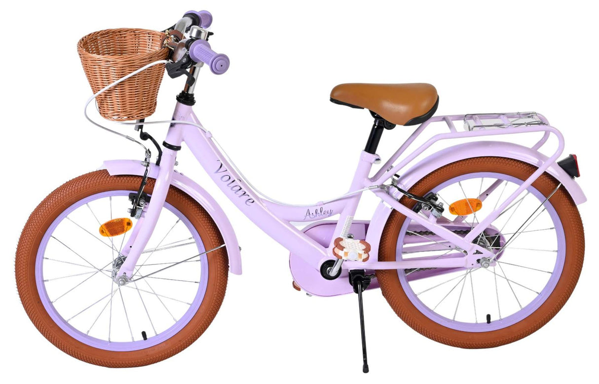 Lila Kinderfahrrad mit Korb, braunen Reifen und gepolstertem Sattel