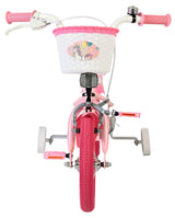Rosa Kinderfahrrad mit Korb und Stützrädern, einhornmotiviert