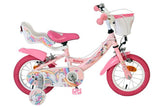 Rosa Kinderfahrrad mit Einhorn-Motiv und Korb vorne