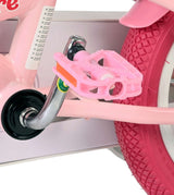 Rosa Fahrradpedal mit verchromter Achse und pinkem Reifen