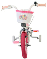 Kinderfahrrad mit pinken Reifen und Korb im Einhorn-Design