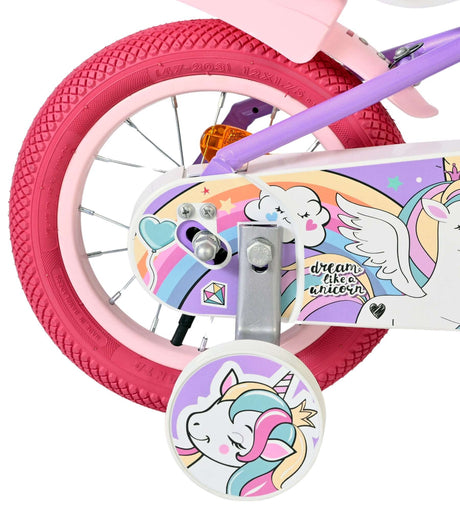 Buntes Kinderfahrrad mit Einhorn-Motiv und pinken Reifen