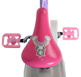 Rosa Fahrradsattel mit Einhorn-Motiv und bunten Pedalen