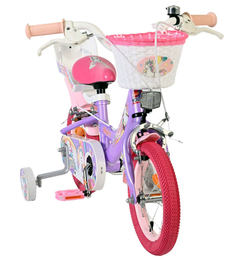 Lila Kinderfahrrad mit Einhorn-Motiv und Korb vorne