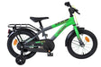 Kinderfahrrad in Grün mit Stützrädern und Gepäckträger
