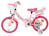Rosa Kinderfahrrad mit Einhorn-Motiv und Korb vorne
