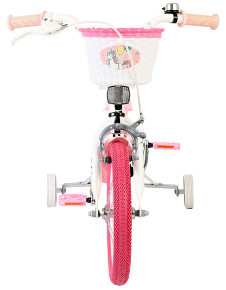 Kinderfahrrad mit pinken Reifen und einem Korb mit Einhorn-Motiv