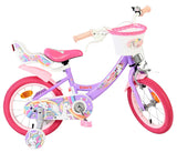 Rosa Kinderfahrrad mit Einhorn-Motiv und Korb vorne