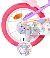 Buntes Kinderfahrrad mit Einhorn-Motiv und pinken Reifen