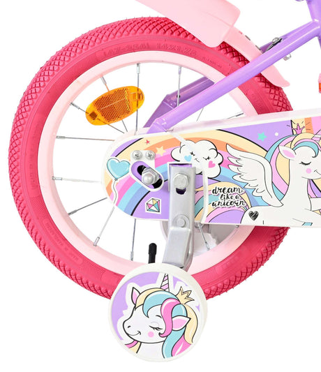 Buntes Kinderfahrrad mit Einhorn-Motiv und pinken Reifen