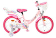 Rosa Kinderfahrrad mit Einhorn-Motiv und Korb vorne