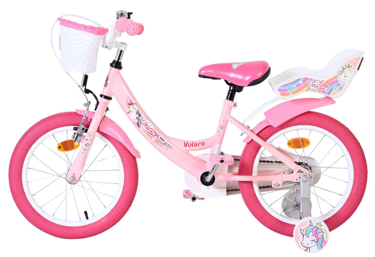 Rosa Kinderfahrrad mit Einhorn-Motiv und Korb vorne