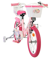 Rosa Kinderfahrrad mit Einhornmotiv und Korb vorne