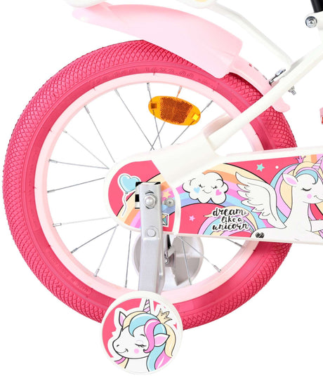 Buntes Kinderfahrrad mit Einhorn-Motiv und pinkem Reifen