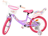 Lila Kinderfahrrad mit Korb und pinken Reifen, einhornmotiviert
