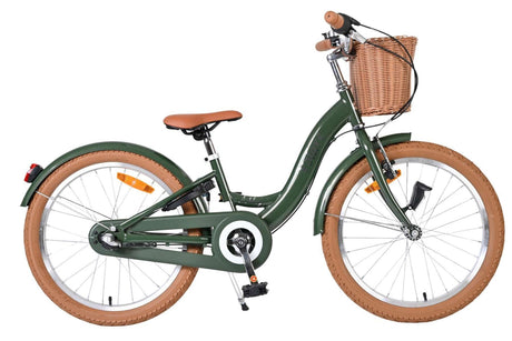 Damenfahrrad in Grün mit Korb und braunen Reifen
