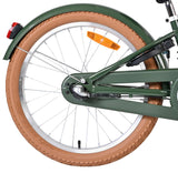 Hinterrad eines Fahrrads mit braunem Reifen und grünem Rahmen