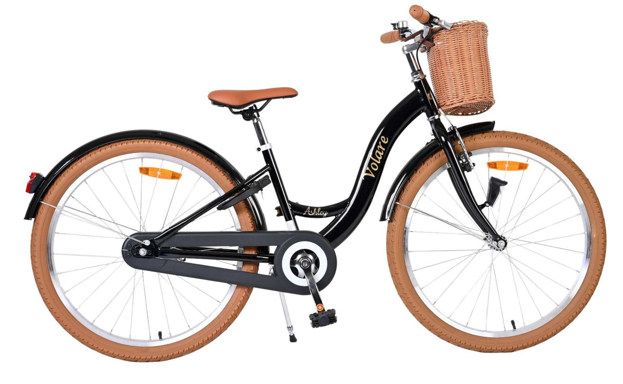 Schwarzes Damenfahrrad mit Korb und braunen Reifen