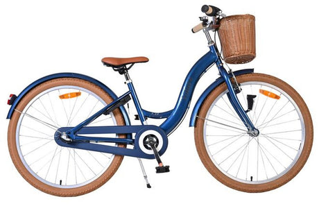 Blaues Fahrrad mit Korb, braunen Reifen und bequemer Sitzfläche