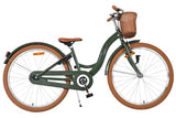 Damenfahrrad in Grün mit Korb und braunen Reifen